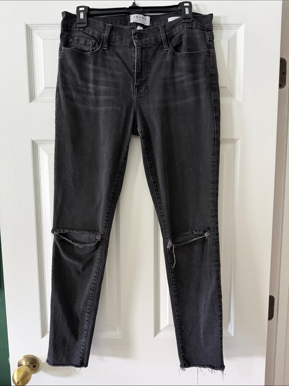 Frame Denim Black Skinny Jeans with Distressed Knees